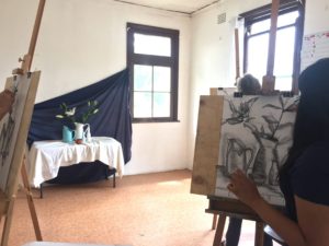 Drawing a still life at a weekend workshop